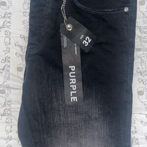 Purple jeans black tag